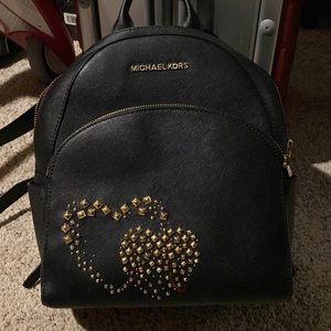 Michael Kors black leather backpack gold heart